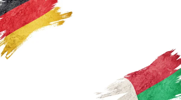 Bandiere di Germania e Madagascar su sfondo bianco — Foto Stock